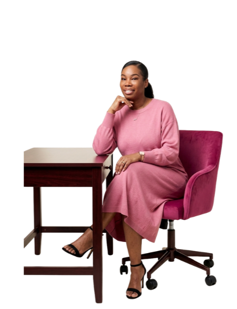 Mareaka, founder of The Bunch Accounting Co., seated at her desk